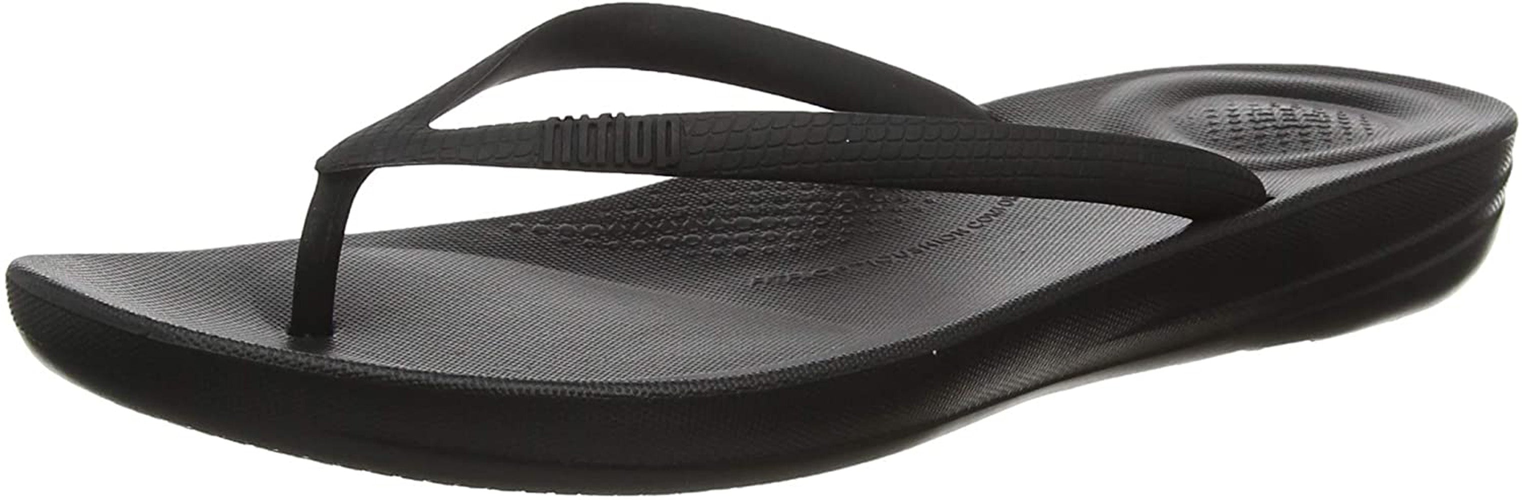 Women's FitFlop Iqushion Ergonomic Flip-Flops in All Black Side Angle View
