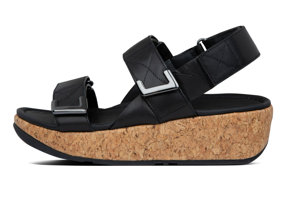Women's FitFlop Remi Adjustable Back-Strap Sandal in All Black from the side