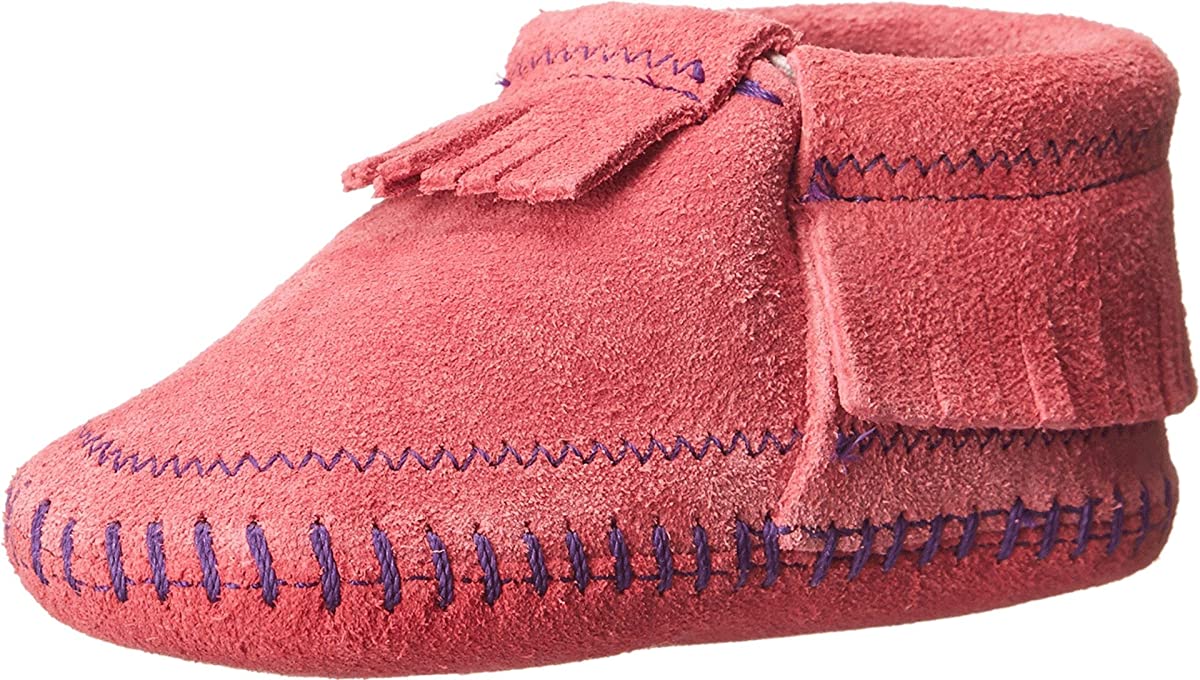 Infant's Minnetonka Riley Moccasin Bootie in Hot Pink from the side view