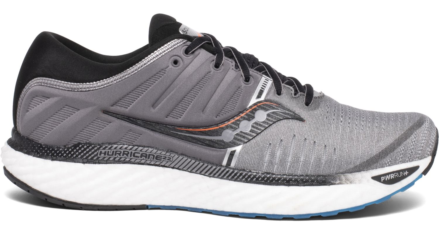 Saucony Men's Hurricane 22 Running Shoe in Grey/Black from the side