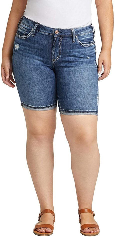 Women's Silver Jeans Plus Size Suki Curvy Fit Mid Rise Bermuda Shorts in Distressed Dark Wash from the front